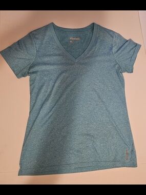 Reebok Women’s Heather Light Blue V-Neck Short Sleeve Tee